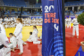 Tournée des drapeaux au Palais des Sports